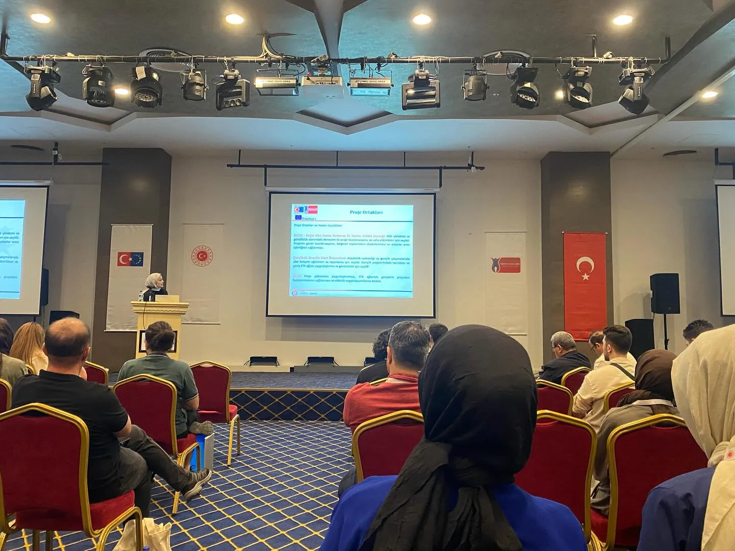 Participants listening to a project presentation at the youth participation training in Eskişehir