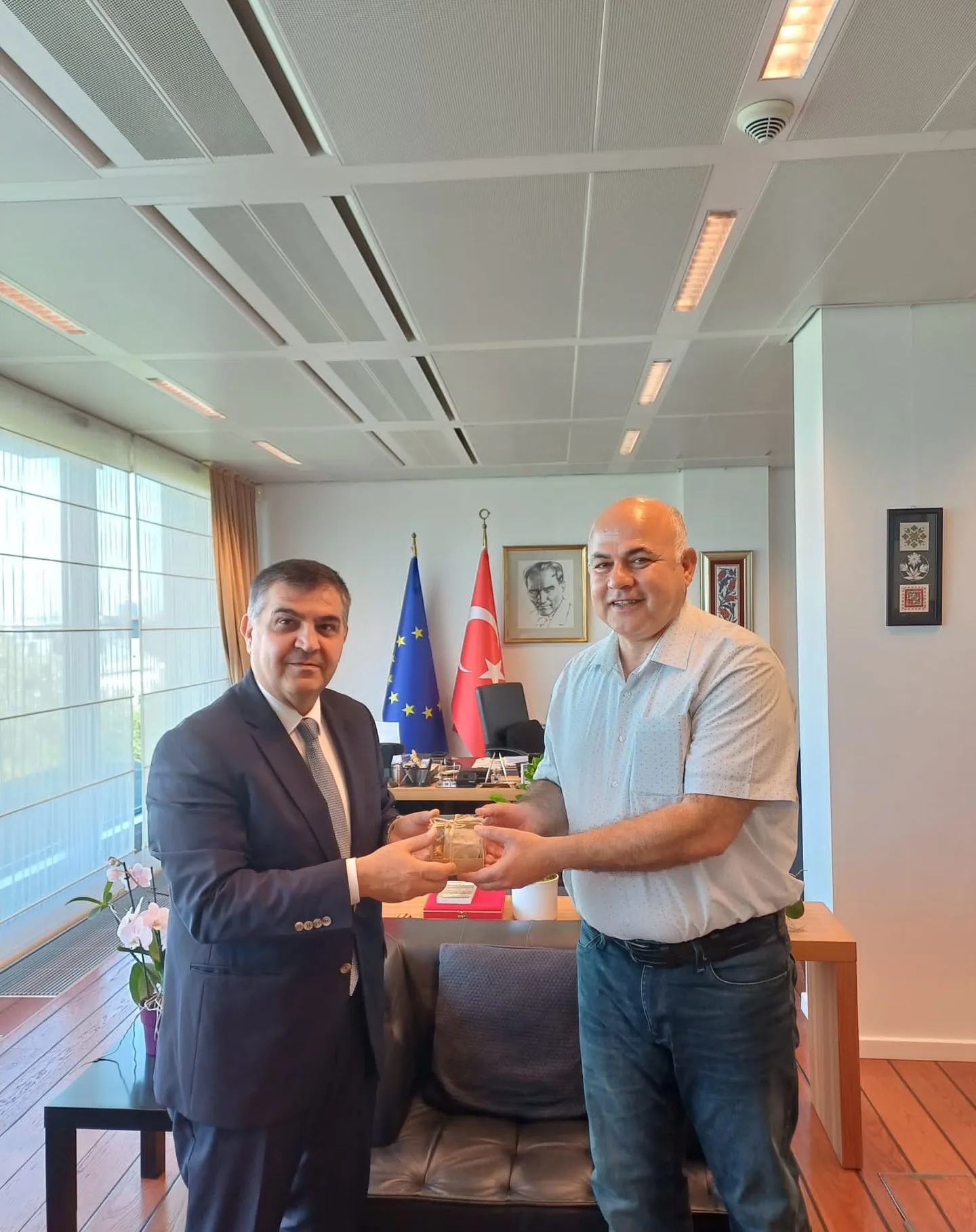 The soap being presented to Ambassador Faruk Kaymakcı on behalf of NATURELDER
